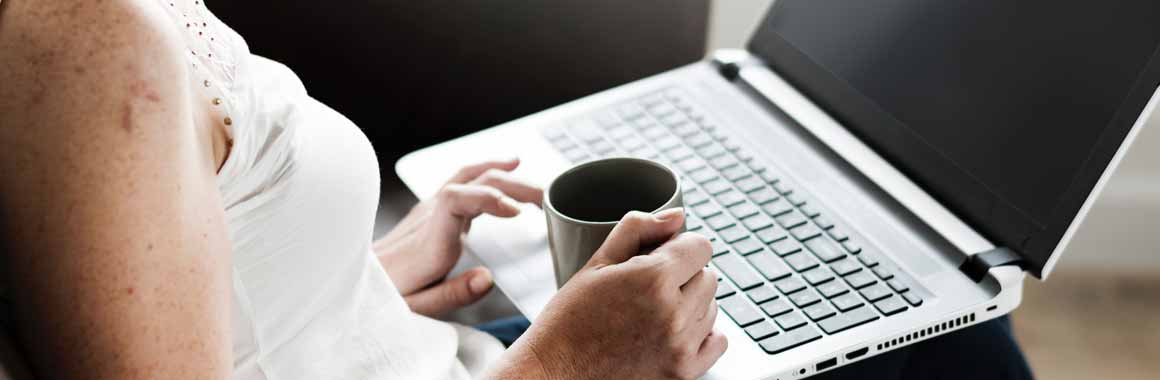 woman on computer on online community