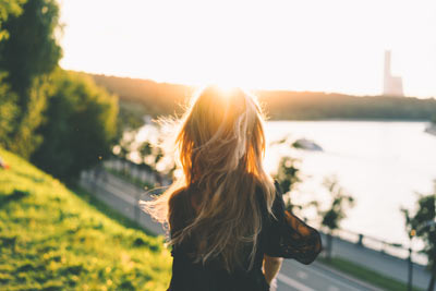 Woman with blond hair looking at view